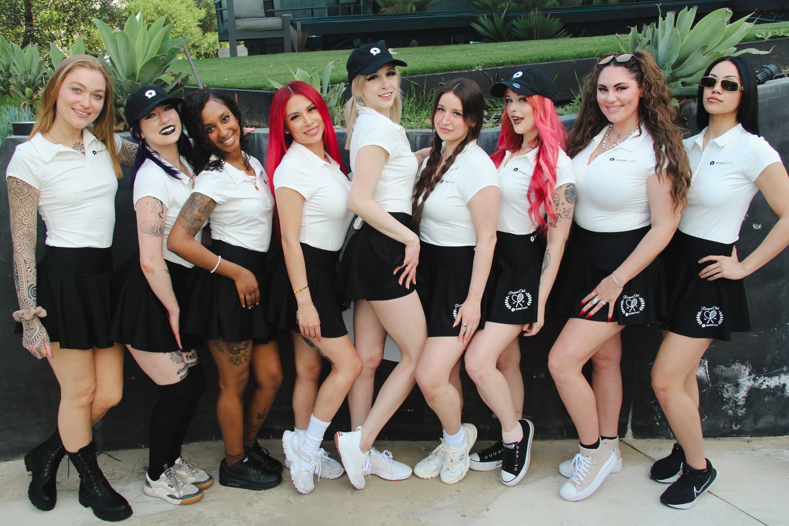 Stripchat House cast members in racquet club uniforms at the house pickleball tournament
