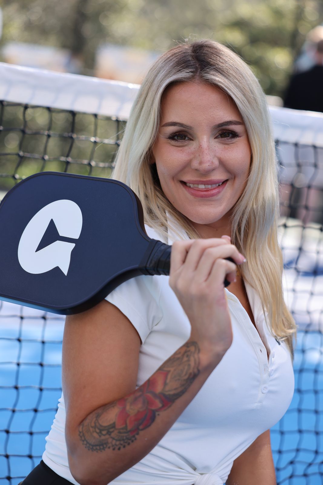 Stripchat House cast members in racquet club uniforms at the house pickleball tournament