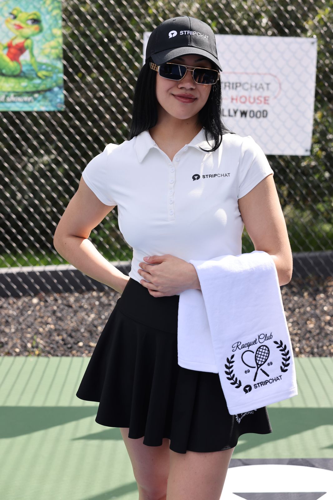 Stripchat House cast members in racquet club uniforms at the house pickleball tournament