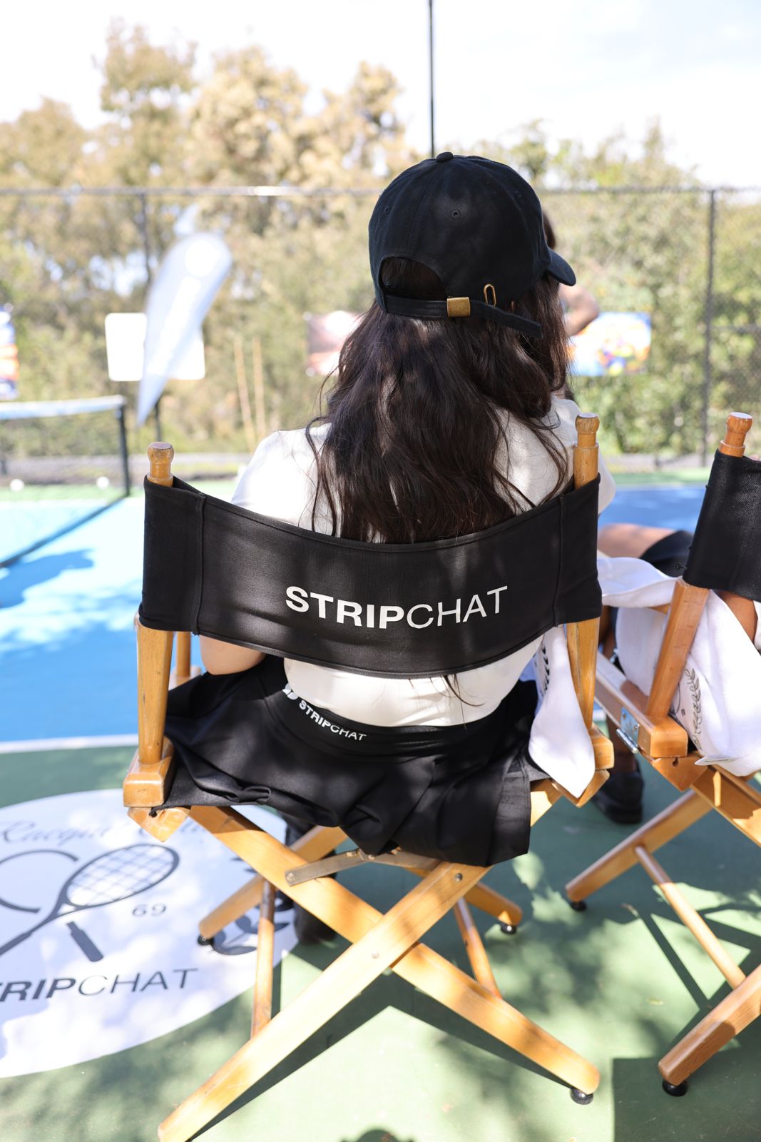 Stripchat House cast members in racquet club uniforms at the house pickleball tournament