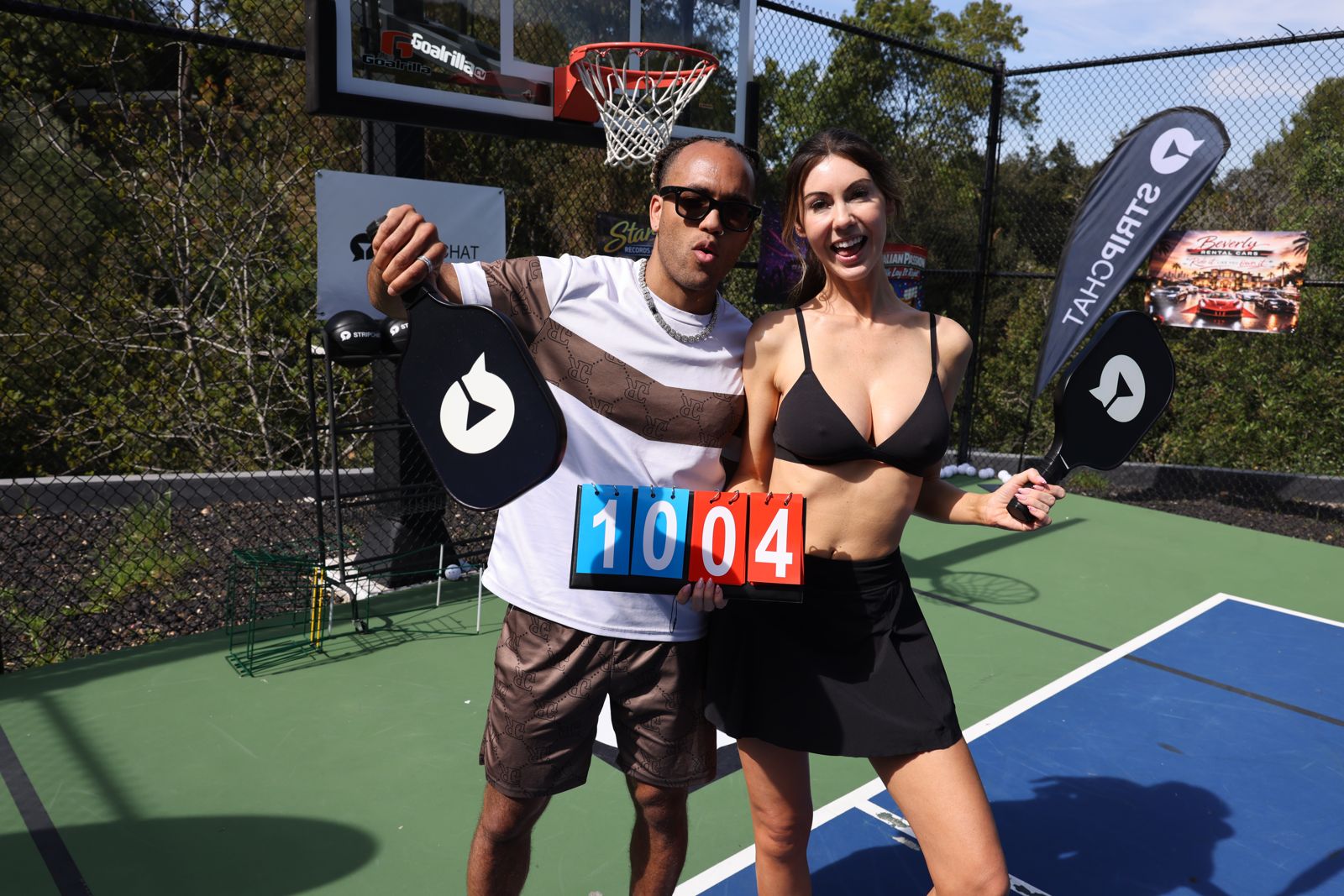 Tournament winners with their trophies at the Stripchat House pickleball day