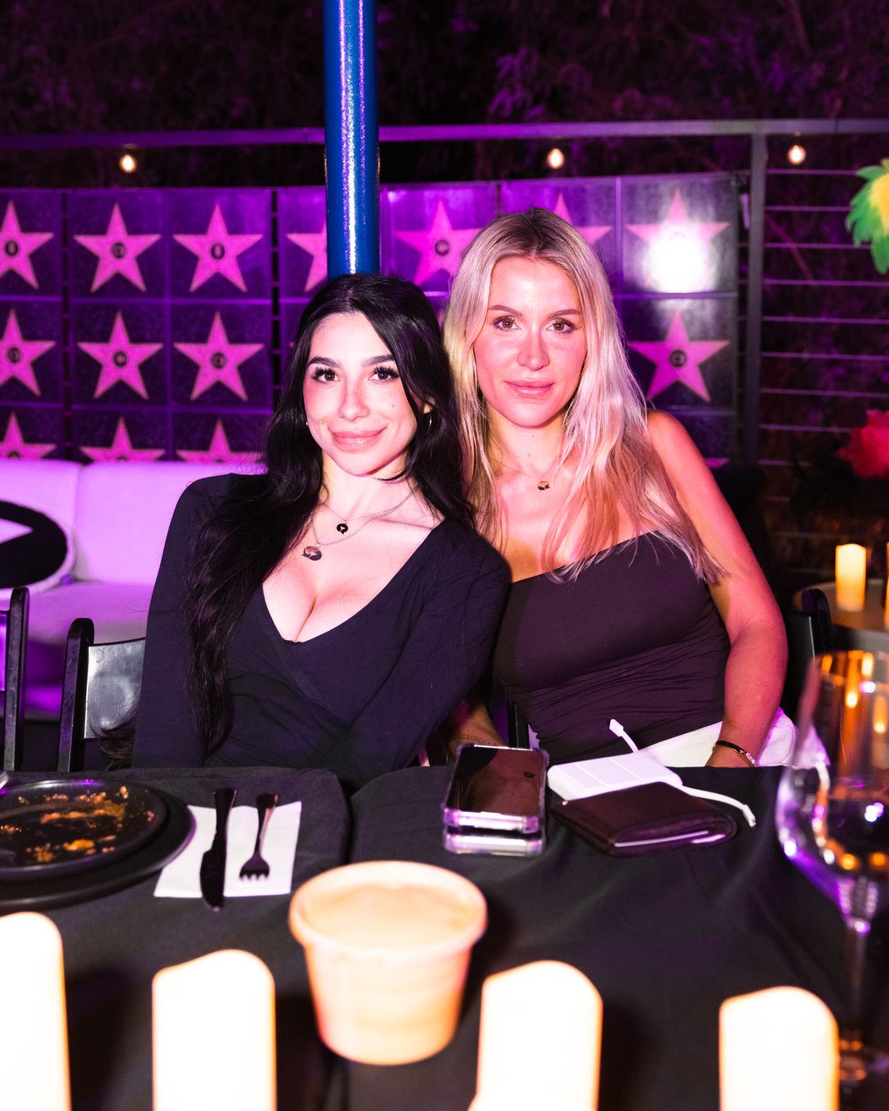 The candle-lit hibachi dinner table at the Stripchat House Hollywood