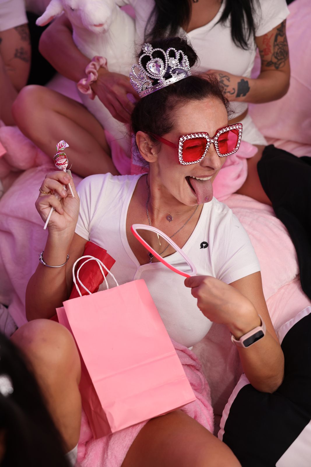 The Barbie-themed slumber party in the pink room at the Stripchat House, tiaras and gift bags included