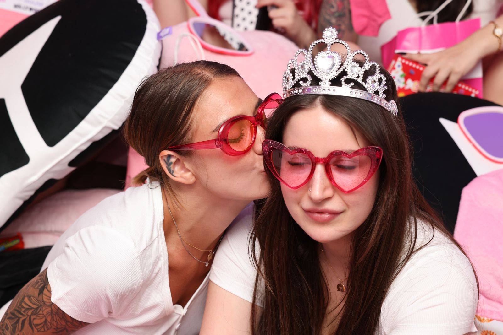 The Barbie-themed slumber party in the pink room at the Stripchat House, tiaras and gift bags included