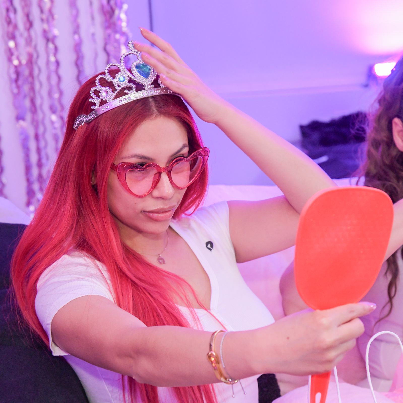 The Barbie-themed slumber party in the pink room at the Stripchat House, tiaras and gift bags included